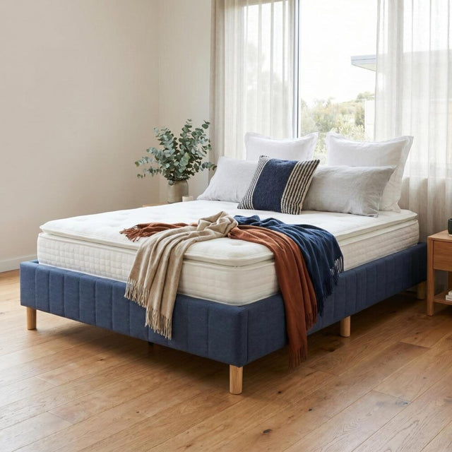 Vetralla Blue Queen bed frame in a modern bedroom