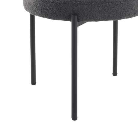 Angaston charcoal boucle dining chair in a modern dining room