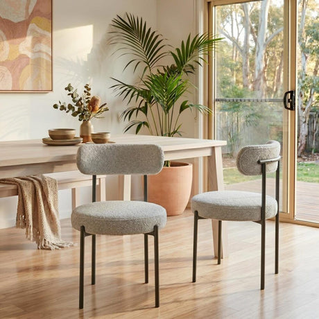Angaston white boucle dining chair in a modern dining room