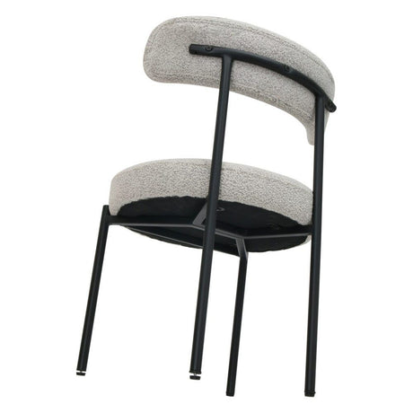Angaston white boucle dining chair in a modern dining room