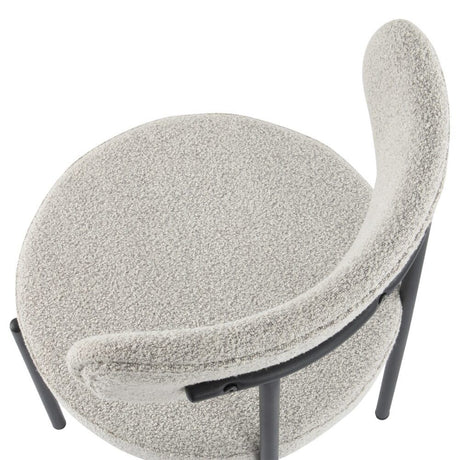 Angaston white boucle dining chair in a modern dining room