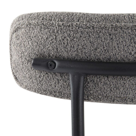 Angaston grey boucle dining chair in a modern dining room