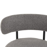 Pair of Elsa grey boucle low bar stools in cafe-style dining setting — Allure Home Collections