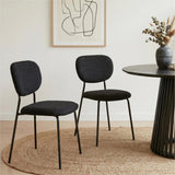Bridgewater charcoal teddy boucle armless dining chairs with steel legs in a dining room