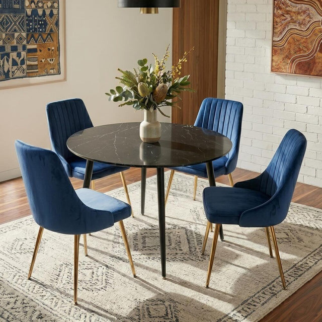 Birdwood black marble and blue velvet dining set in a modern dining room