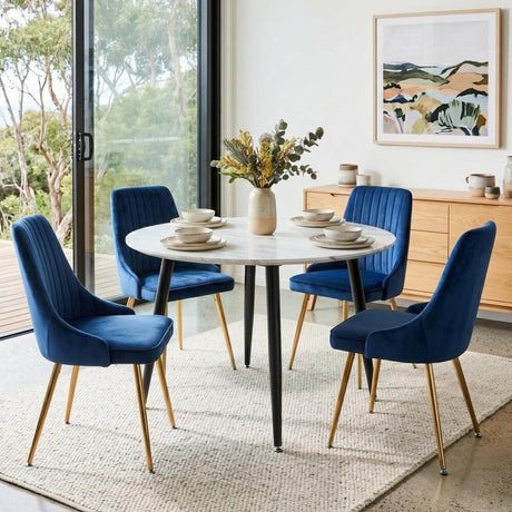 Birdwood white marble and blue velvet dining set in a modern dining room