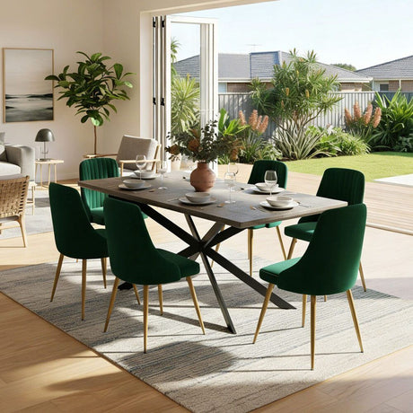 Kersbrook dark grey marble and green velvet dining set in a modern dining room