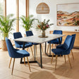 Ashton white marble and blue velvet dining set in a modern dining room