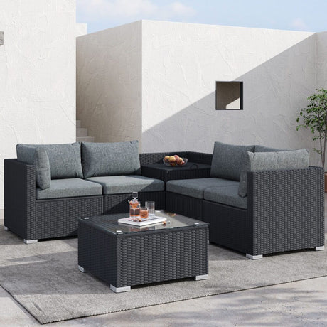 Peregian black wicker outdoor lounge set on a sunny patio