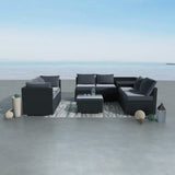 Eight piece black modular wicker outdoor lounge set with corner storage