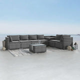 Eight piece grey modular wicker outdoor lounge set with corner storage