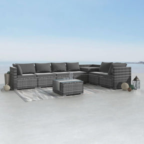 Eight piece grey modular wicker outdoor lounge set with corner storage