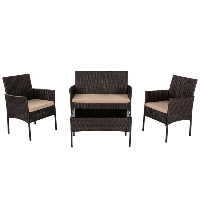 Natural rattan wicker outdoor lounge setting with sofa armchairs and table on a patio