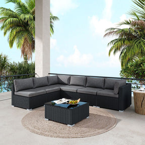Mooloolaba black wicker outdoor lounge set on a sunny patio