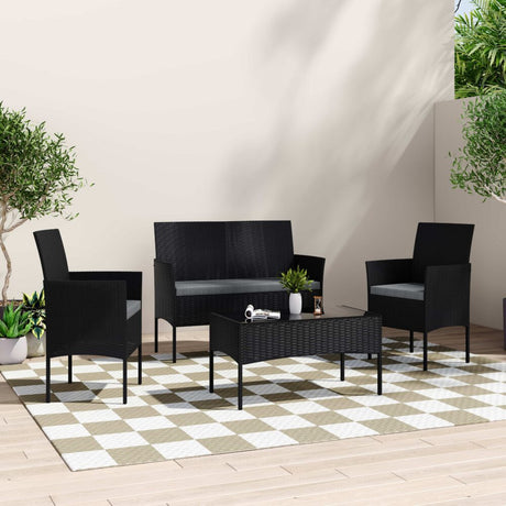 Buddina black wicker outdoor lounge set on a sunny patio