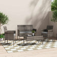 Outdoor lounge setting with sofa armchairs and table on a patio