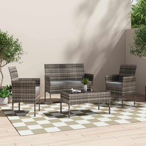 Outdoor lounge setting with sofa armchairs and table on a patio