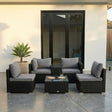 Mudjimba black wicker outdoor lounge set on a sunny patio