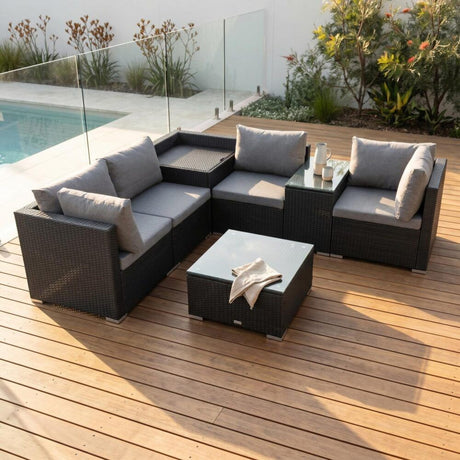 Mudjimba black wicker outdoor lounge set on a sunny patio