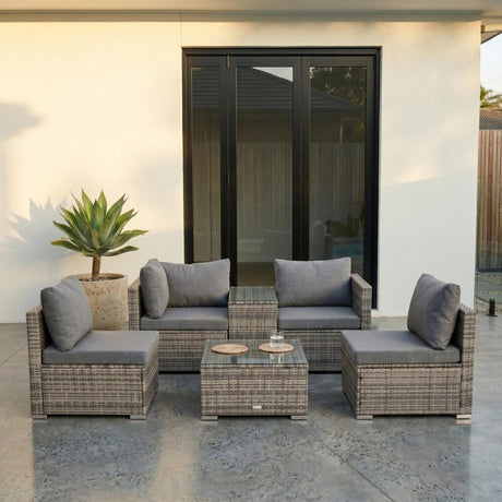 Mudjimba grey wicker outdoor lounge set on a sunny patio
