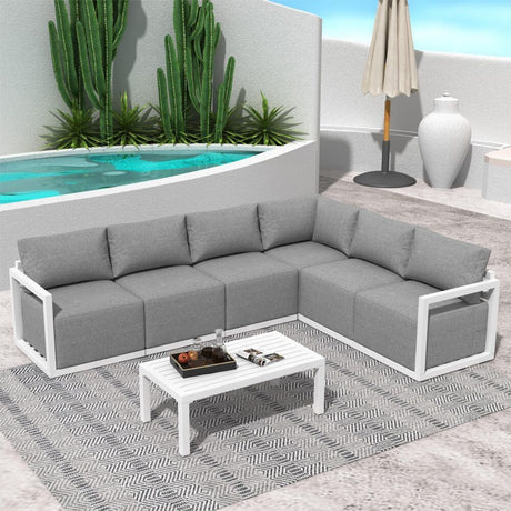 Noosa white aluminium outdoor lounge set on a sunny patio