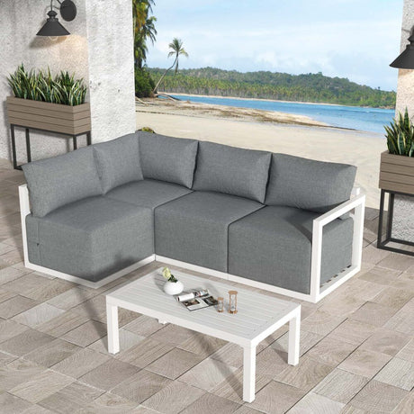 Noosa white aluminium outdoor lounge set on a sunny patio