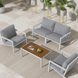 Warriewood 5 piece outdoor sofa set in white aluminium on a garden patio