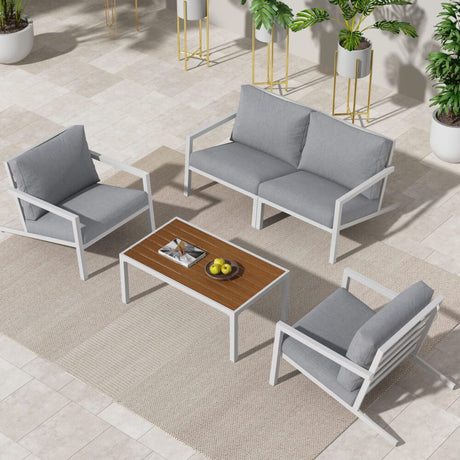 Coolum white aluminium outdoor lounge set on a sunny patio