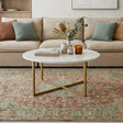 Cathkin white marble effect gold legs coffee table in a modern living room
