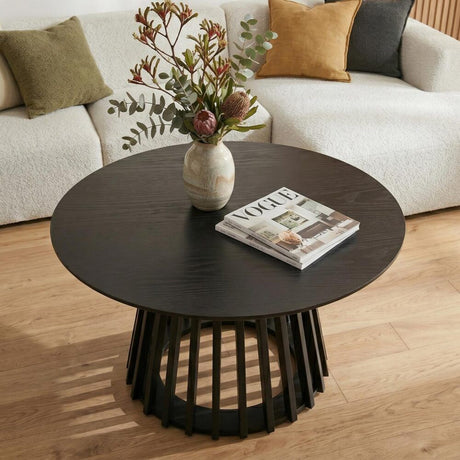 Molesworth matte black timber coffee table in a modern living room