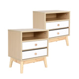 Suffolk Park oak two drawer bedside tables shown as a matching pair in a warm bedroom