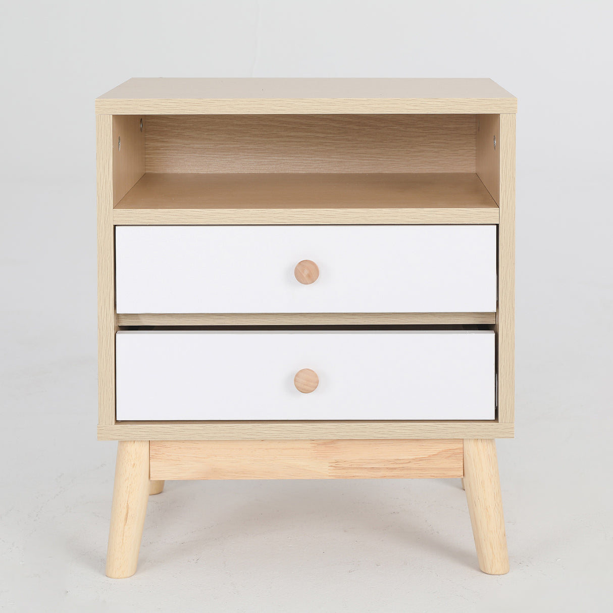 Suffolk Park oak two drawer bedside tables shown as a matching pair in a warm bedroom