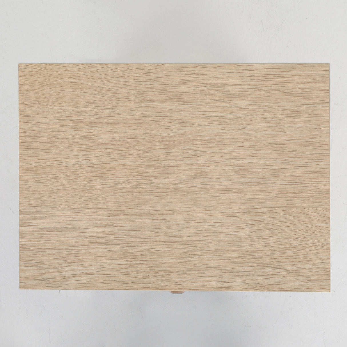 Suffolk Park oak two drawer bedside tables shown as a matching pair in a warm bedroom