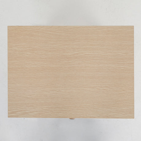 Suffolk Park oak two drawer bedside tables shown as a matching pair in a warm bedroom