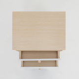 Suffolk Park oak two drawer bedside tables shown as a matching pair in a warm bedroom