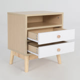 Suffolk Park oak two drawer bedside tables shown as a matching pair in a warm bedroom