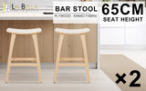 Pair of KANSO wooden padded bar stools at kitchen counter — Allure Home Collections