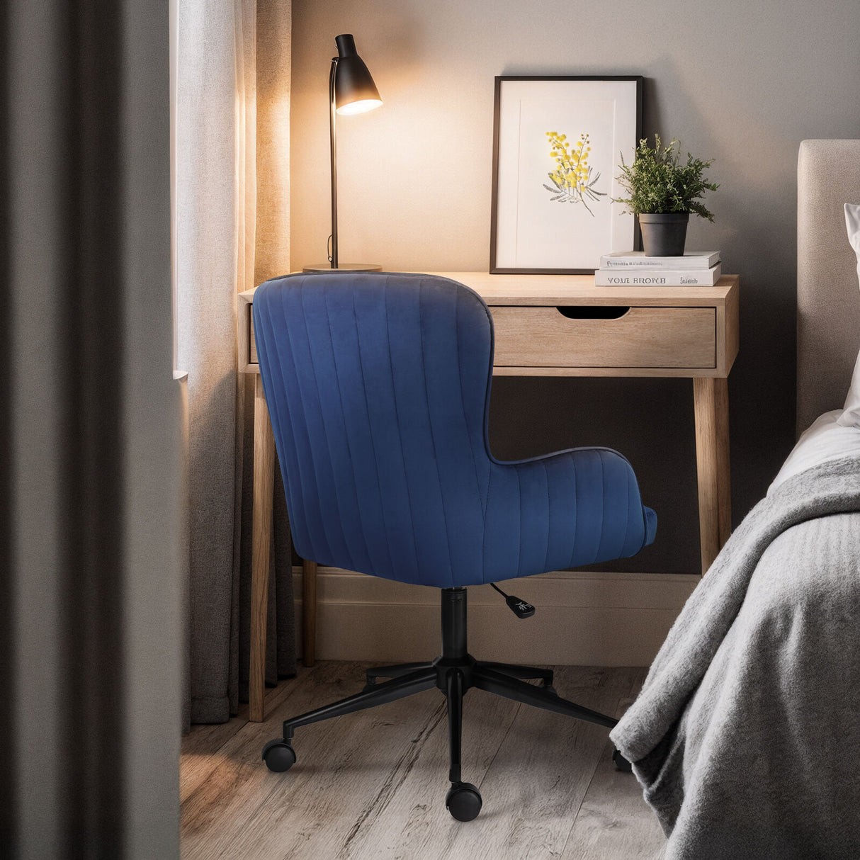 Balingup blue velvet swivel office chair at a home desk
