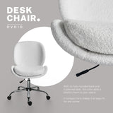 Scarborough white teddy boucle armless swivel office chair at a desk