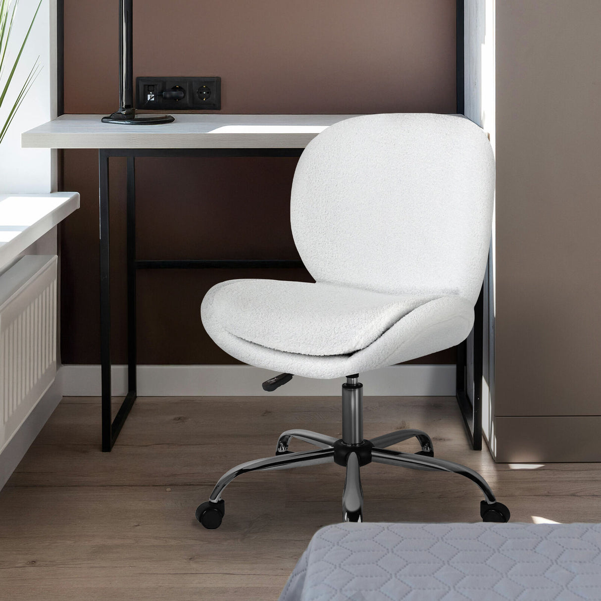 Scarborough white teddy boucle armless swivel office chair at a desk
