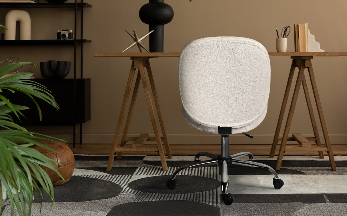 Scarborough white teddy boucle armless swivel office chair at a desk