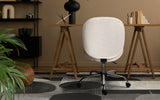 Scarborough white teddy boucle armless swivel office chair at a desk