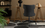 Iluka black faux leather office chair at a desk, view 2