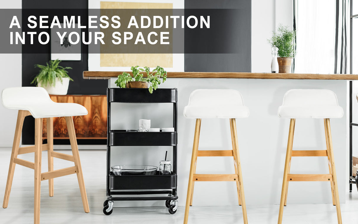 Four Sophia mid-century bar stools in styled kitchen setting — Allure Home Collections