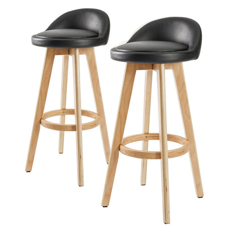 Sandhurst black wooden bar stool with PVC leather swivel seat in a Scandinavian kitchen