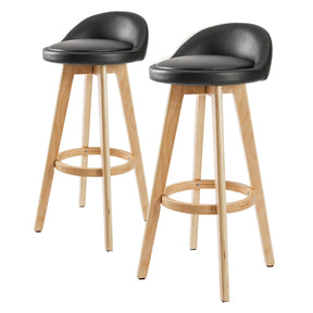 Capel Sound black leather look wooden bar stool 2pcs set with plywood legs in a modern kitchen