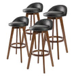 Sandhurst black and brown wooden bar stool with PVC leather swivel seat in a modern kitchen