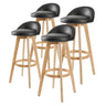 Set of 4 Leila wooden bar stools at kitchen island — Allure Home Collections