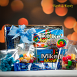 Isigny chocolate and sweets gift hamper of chocolates and confectionery finished with a blue ribbon