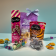 Reims chocolate and sweets gift hamper filled with assorted Australian lollies and chocolates in a gift bag
